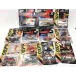 Collection of James Bond related diecast model vehicles in bubble packs by Corgi and Johnny