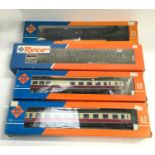 4 boxed Roco HO carriages - 4267, 4269, 4359 and 44740. Generally Good condition.