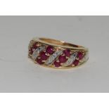 14ct gold ladies diamond and ruby ring size J