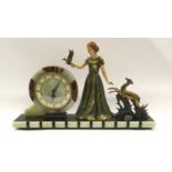 Art Deco clock centre piece metal and onyx depicting a lady and wild animals brass painted enamel