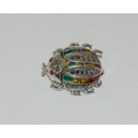 Silver and plique a jour bug brooch set with marcasite
