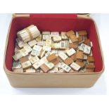 Vintage ivory and box wood mahjong tiles.