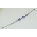 14ct gold on silver tanzanite and white zircon bracelet