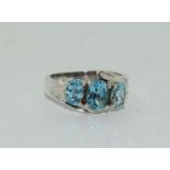 Lovely blue topaz trilogy 925 silver ring, size N.