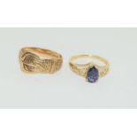 2x9ct gold ladies rings a buckle rind and a sapphire ring 4.3g