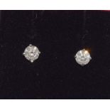 Pair 14ct white gold diamond stud earrings of approx 65 points