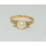 9ct Gold and Pearl ring - boxed.