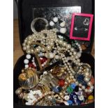 Large box of vintage costume jewellery.