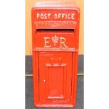 A red British ERII post box with keys