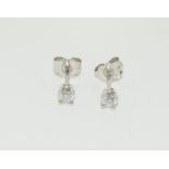 Diamond 9ct white gold stud earrings.