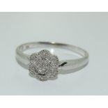 9ct white gold diamond cluster ring. Size N. 1.9 grams.
