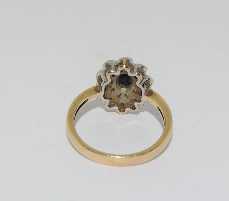 9 carat gold diamond and Sapphire flower ring size N - Image 3 of 3