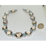 Large silver and smokey quarts with blue topaz necklace