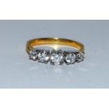 Gold on silver 5 stone CZ ring. Size O.