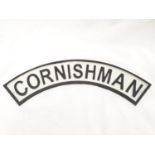 A cast iron Cornishman plaque.(241).