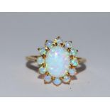 Gold on silver opaline cluster ring. Size N.