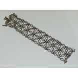 A heavy wide silver paste bracelet. Marked 925. 18cms long.