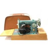 Sew-Tric Alfa electric sewing machine with carry case