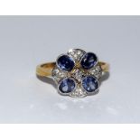 Gold on silver tanzanite CZ ring. Size O.