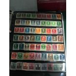 Two stamp albums of the German states both East and West Germany