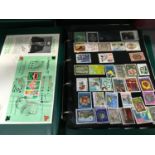 Two stamp albums including Dutch and Belgium stamps