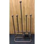 A boot rack/scraper (ref 174)