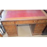 Mahogany leather top pedestal desk 4 draws per side with central draw having brass handles