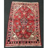 Hamedan rug in medallion blue, red and cream. 202x124