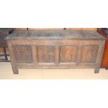 Carved oak 4 panel coffer with original center lock and twin sliding front panels 70x165x60cm