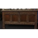 Good elm coffer with carved panels and original metal fitments solid plank top missing part of