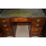 Mahogany Edwardian scallop front leather top writing desk fitted brass swan neck handles 75x120x55cm