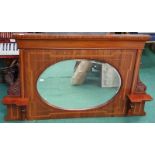 Edwardian inlaid over-mantle with beveled edge glass and oval mirror shape.