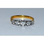 Gold on silver 5 stone CZ ring. Size O.