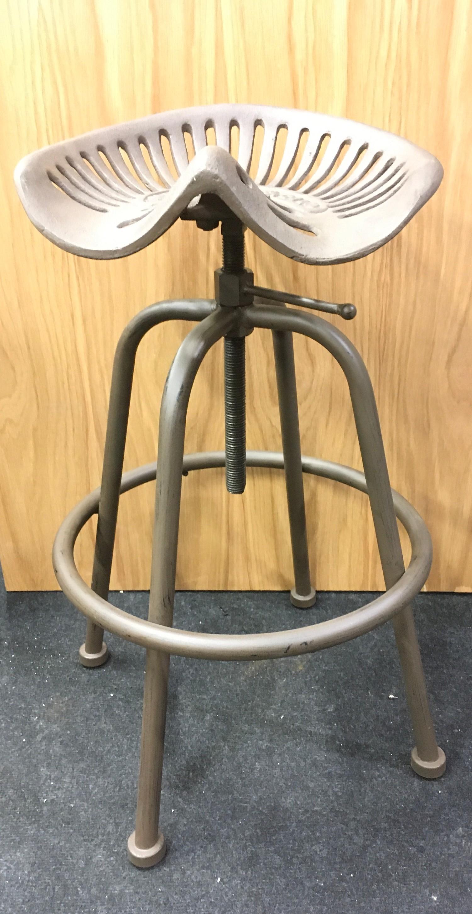 A heavy tractor stool. (ref 176)