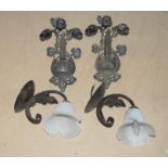 Two pairs of ornate wall light fittings