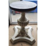 An ornate side table with carved white base. W 57cm x D 57cm x H 79cm)