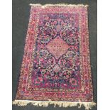 A Vintage Kashan rug 220x140cm