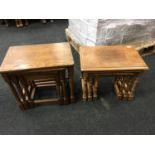 Two sets of oak nesting tables.