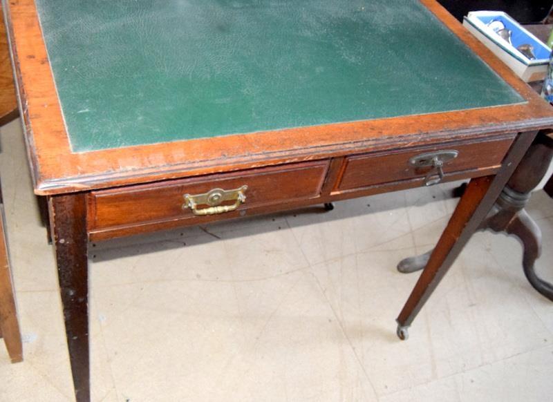 Edwardian mahogany 2 draw leather top writing table on tapered supports and with brass handles