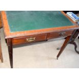 Edwardian mahogany 2 draw leather top writing table on tapered supports and with brass handles