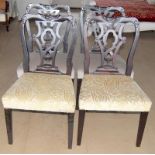 Set of mahogany carved Victorian dining chairs with upholstered seats on tapered supports