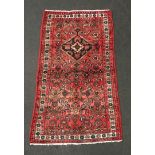 Hamedan repeated design red rug. 192x112