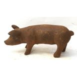 A small cast iron pig. (ref 188)