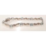 Blue topaz 925 silver line bracelet.