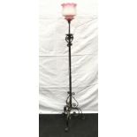 Wrought iron stard lamp up lighter with Vaseline glass shade 165cm tall 35cm across the base