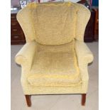 Wing back mahogany framed armchair in the georgian style with square wood short frame legs