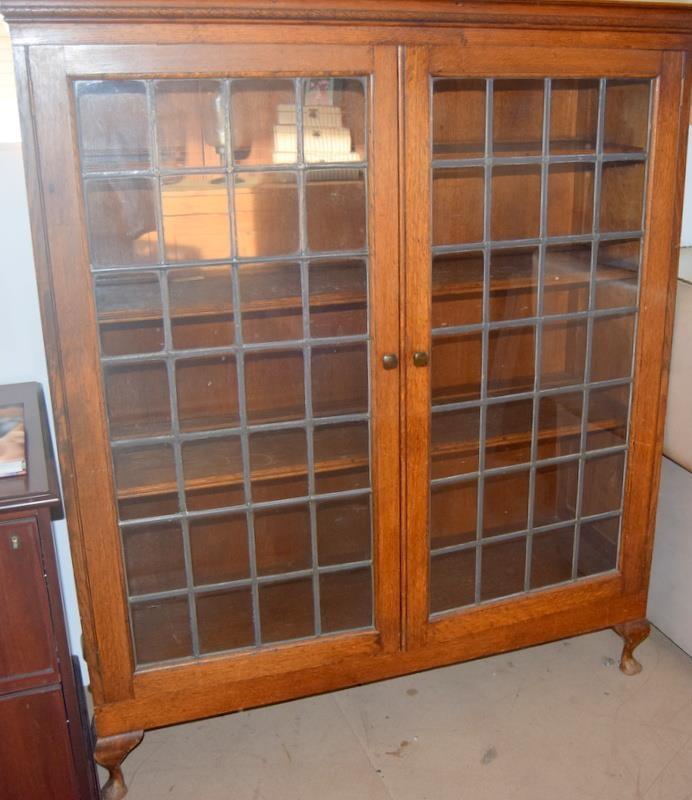 Oak leaded glass adjustable shelf bookcase on stub legs 150x130x45cm