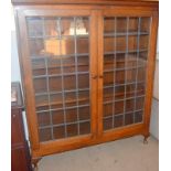 Oak leaded glass adjustable shelf bookcase on stub legs 150x130x45cm