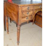 Mahogany leather topped 7 draw writing table on turned supports 75x100x50cm