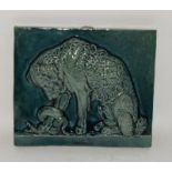 Embossed tile plaque possibly by Dunmore depicting a dog & snake 7.25" x 6.6" 264